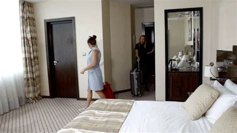 hairy lesbians|Two girls lesbian checking in to the hotel room. Vacation together。